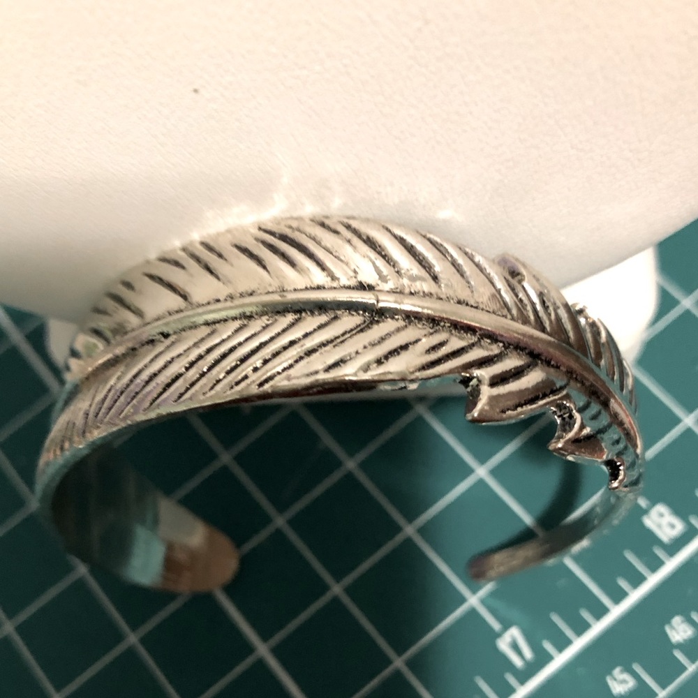 Silver metal feather cuff bracelet